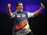 Cristo Reyes of Spain celebrates winning his second round match against Kevin Painter of England on Day Eight of the William Hill PDC World Darts Championships on December 28, 2014