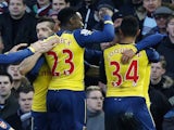 Arsenal celebrates after Arsenal's English striker Danny Welbeck scored their second goal during the English Premier League football match against West Ham on December 28, 2014
