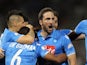 Napoli's Argentine striker Gonzalo Higuain (C) celebrates with teammates after scoring during their Italian Super Cup football match against Juventus on December 22, 2014