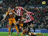 Hull City's English defender James Chester scores their second goal during the English Premier League football match between Sunderland and Hull City at The Stadium of Light in Sunderland, north east England on December 26, 2014