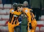 Hull City's Croatian striker Nikica Jelavic celebrates scoring their third goal with Hull City's Ivorian striker Yannick Sagbo during the English Premier League football match between Sunderland and Hull City at The Stadium of Light in Sunderland, north e