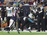 Allen Hurns #88 of the Jacksonville Jaguars catches the ball in the first quarter while under pressure by Johnathan Joseph #24 of the Houston Texans in a NFL game on December 28, 2014