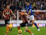 Robbie Brady of Hull City holds off Matthew James of Leicester City during the Barclays Premier League match between Hull City and Leicester City at KC Stadium on December 28, 2014