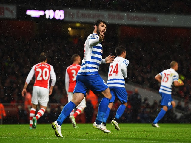 Charlie Austin of QPR celebrates scoring his penalty during the Barclays Premier League match between Arsenal and Queens Park Rangers at Emirates Stadium on December 26, 2014