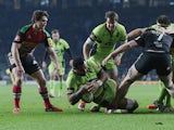 Samu Manoa of Northampton dives over for a try during the Aviva Premiership match between Harlequins and Northampton Saints at Twickenham Stadium on December 27, 2014