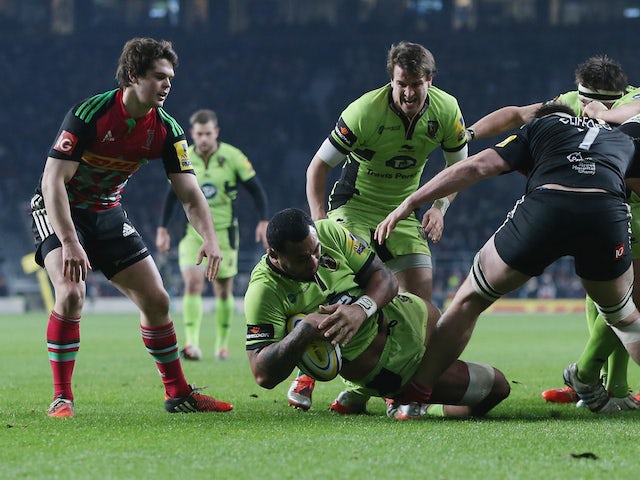 Samu Manoa of Northampton dives over for a try during the Aviva Premiership match between Harlequins and Northampton Saints at Twickenham Stadium on December 27, 2014