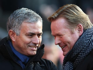 Jose Mourinho, manager of Chelsea talks to Ronald Koeman, manager of Southampton prior to the Barclays Premier League match between Southampton and Chelsea at St Mary's Stadium on December 28, 2014