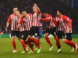 Ryan Bertrand of Southampton celebrates with team mates as he scores their second goal during the Barclays Premier League match between Crystal Palace and Southampton at Selhurst Park on December 26, 2014