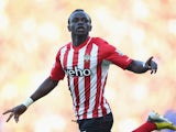 Sadio Mane of Southampton celebrates scoring the opening goal during the Barclays Premier League match between Southampton and Chelsea at St Mary's Stadium on December 28, 2014
