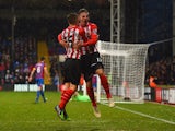 Toby Alderweireld of Southampton celebrates with James Ward-Prowse as he scores teir third goal during the Barclays Premier League match between Crystal Palace and Southampton at Selhurst Park on December 26, 2014