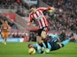 Adam Johnson of Sunderland rounds goalkeeper Allan McGregor of Hull City to score the opening goal following a poor back pass during the Barclays Premier League match between Sunderland and Hull City at the Stadium of Light on December 26, 2014