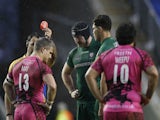 Referee Greg Garner shows a red card to Tom May of London Welsh as Daniel Leo pf London Irish looks on during the Aviva Premiership match on Boxing Day 2014