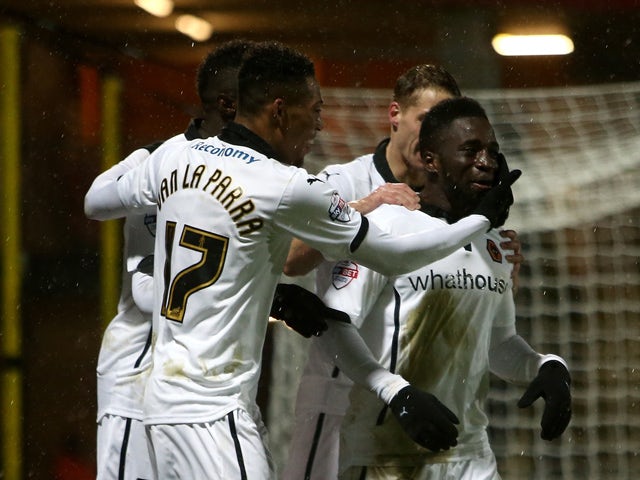 Wolves celebrate with Nouha Dicko after he scores to make it 1-0 during the Sky Bet Championship match between Watford and Wolverhampton Wanderers at Vicarage Road on December 26, 2014