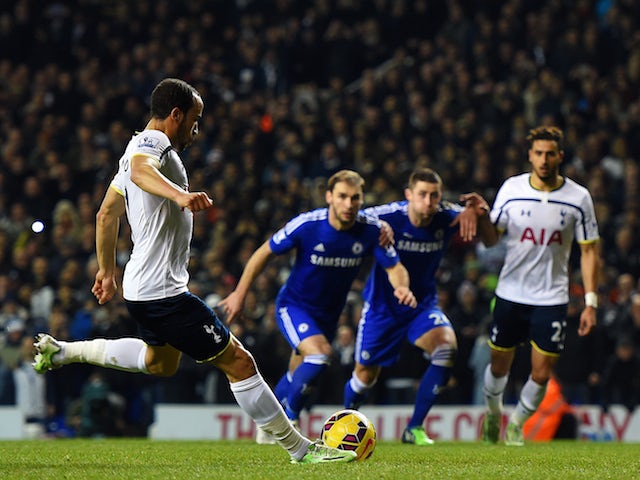 Andros Townsend of Spurs scores his team's third goal from the penalty spot during the Barclays Premier League match against Chelsea on January 1, 2015