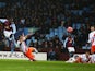 Christian Benteke of Aston Villa scores the opening goal during the FA Cup Third Round match between Aston Villa and Blackpool at Villa Park on January 4, 2015