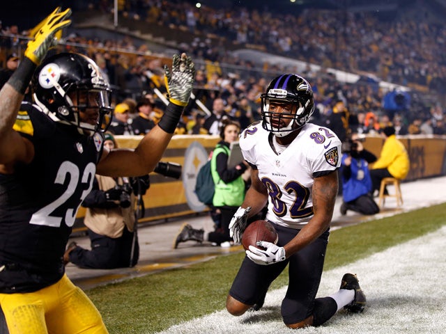 Torrey Smith #82 of the Baltimore Ravens celebrates a third quarter touchdown against the Pittsburgh Steelers during their AFC Wild Card game at Heinz Field on January 3, 2015