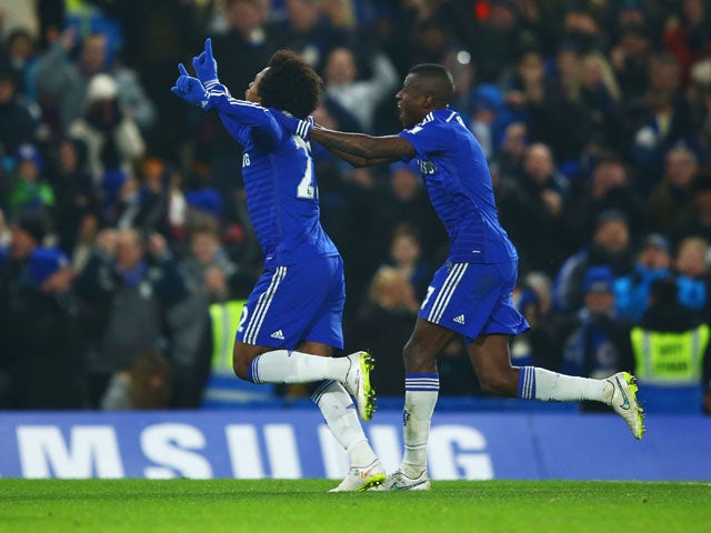 Willian of Chelsea celebrates with Ramires as he scores their first goal during the FA Cup Third Round match between Chelsea and Watford at Stamford Bridge on January 4, 2015