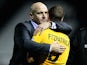 Gary Brabin, manager of Southport consoles David Fitzpatrick of Southport during the FA Cup Third Round match against Derby County on January 3, 2015