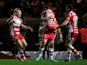 Billy Twelvetress of Gloucester runs to celebrate with Mark Atkinson of Gloucester at the final whistle during the Aviva Premiership match between Exeter Chiefs and Gloucester Rugby at Sandy Park on January 3, 2015