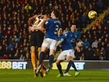 Ahmed Elmohamady of Hull City heads the opening goal during the Barclays Premier League match between Hull City and Everton at KC Stadium on January 1, 2015