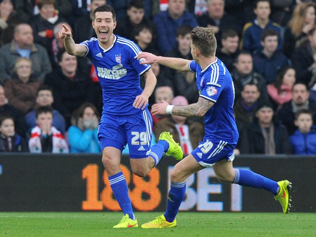 Ipswich Town's English midfielder Darren Ambrose celebrates scoring the opening goal during the English FA Cup third round football match between Southampton and Ipswich Town at St Mary's Stadium in Southampton, southern England, on January 4, 2015