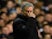 Jose Mourinho, manager of Chelsea reacts on the touchline next to Mauricio Pochettino, manager of Spurs during the Barclays Premier League on January 1, 2015