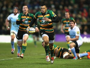Luther Burrell of Northampton breaks with the ball during the Aviva Premiership match against Newcastle Falcons on January 2, 2015