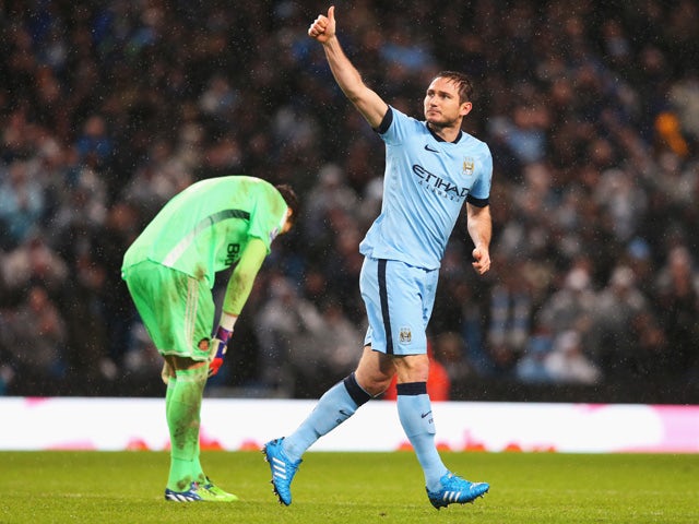 Frank Lampard of Manchester City celebrates his team's third goal during the Barclays Premier League match between Manchester City and Sunderland at Etihad Stadium on January 1, 2015