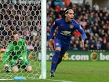 Radamel Falcao of Manchester United celebrates scoring his team's first goal during the Barclays Premier League match between Stoke City and Manchester United at Britannia Stadium on January 1, 2015