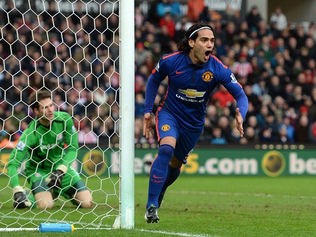 Radamel Falcao of Manchester United celebrates scoring his team's first goal during the Barclays Premier League match between Stoke City and Manchester United at Britannia Stadium on January 1, 2015