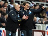 Newcastle United caretaker coach John Carver (r) makes a point with assistant Steve Stone during the Barclays Premier League match between Newcastle United and Burnley at St James' Park on January 1, 2015
