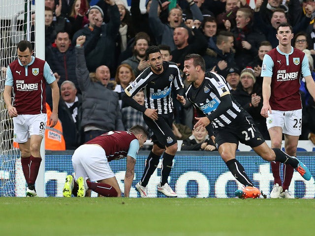 Newcastle United's English defender Steven Taylor celebrates scoring the opening goal of the English Premier League football match between Newcastle United and Burnley at St James' Park in Newcastle-upon-Tyne, north east England, on January 1, 2015