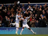 Leroy Fer of QPR celebrates with teammates after scoring the opening goal during the Barclays Premier League match between Queens Park Rangers and Swansea City at Loftus Road on January 1, 2015