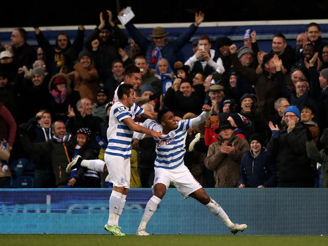 Leroy Fer of QPR celebrates with teammates after scoring the opening goal during the Barclays Premier League match between Queens Park Rangers and Swansea City at Loftus Road on January 1, 2015
