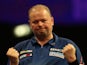 Raymond van Barneveld of the Netherlands celebrates winning a set during his quarter final match against Stephen Bunting on January 2, 2015