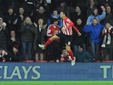 Southampton's Serbian midfielder Dusan Tadic celebrates scoring his team's second goal during the English Premier League football match between Southampton and Arsenal at St Mary's Stadium in Southampton, southern England, on January 1, 2015