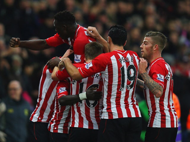 Sadio Mane of Southampton celebrates with team mates as he scores their first goal during the Barclays Premier League match between Southampton and Arsenal at St Mary's Stadium on January 1, 2015