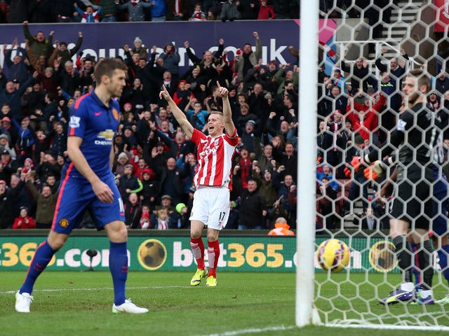 Ryan Shawcross of Stoke City celebrates scoring the first goal during the Barclays Premier League match between Stoke City and Manchester United at Britannia Stadium on January 1, 2015