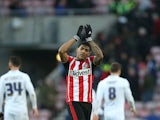 Sunderland's Dutch defender Patrick van Aanholt applauds supporters at the final whistle in the English FA Cup third round football match between Sunderland and Leeds United at Stadium of Light in Sunderland, north east England on January 4, 2015