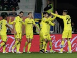 Villarreal players celebrate their first goal during the Spanish league football match Elche FC vs Villarreal CFat the Martinez Valero stadium in Elche on January 3, 2015