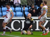 Joe Simpson of Wasps celebrates after scoring their third try during the Aviva Premiership match between Wasps and Sale Sharks at The Ricoh Arena on January 4, 2015