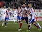 Atletico Madrid's midfielder Raul Garcia celebrates after scoring during the Spanish Copa del Rey (King's Cup) round of 16 first leg football match Club Atletico de Madrid vs Real Madrid CF at the Vicente Calderon stadium in Madrid on January 7, 2015