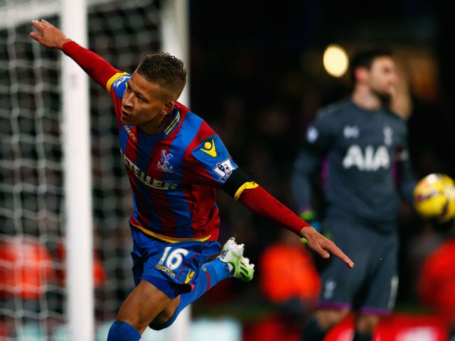 Despair for Hugo Lloris of Spurs as Dwight Gayle of Crystal Palace celebrates scoring their first and equalisin goal from a penalty during the Barclays Premier League match between Crystal Palace and Tottenham Hotspur at Selhurst Park on January 10, 2015