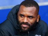 Derby County substitute Darren Bent sits on the bench before kick off during the Sky Bet Championship match between Ipswich Town and Derby County at Portman Road on January 10, 2015 