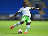 Wolfburg player Junior Malanda in action during the friendly match between Cardiff City and VFL Wolfsburg at Cardiff City Stadium on August 2, 2014