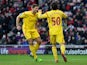 Lazar Markovic of Liverpool celebrates scoring the opening goal with Steven Gerrard during the Barclays Premier League match between Sunderland and Liverpool at Stadium of Light on January 10, 2015