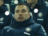 Lukas Podolski of FC Internazionale Milano sits on the bench during the Serie A match between Juventus FC and FC Internazionale Milano at Juventus Arena on January 6, 2015