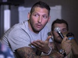 Former Italian national football player, Marco Materazzi, talks during a press conference on September 18, 2013
