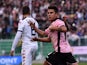Paulo Dybala of Palermo celebrates after scoring his team's third goal during the Serie A match between US Citta di Palermo and Cagliari Calcio at Stadio Renzo Barbera on January 6, 2015