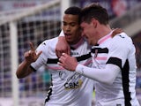 Robin Quaison of Palermo celebrates with Andrea Belotti after scoring the equalizing goal (2-2) during the Serie A match between ACF Fiorentina and US Citta di Palermo at Stadio Artemio Franchi on January 11, 2015